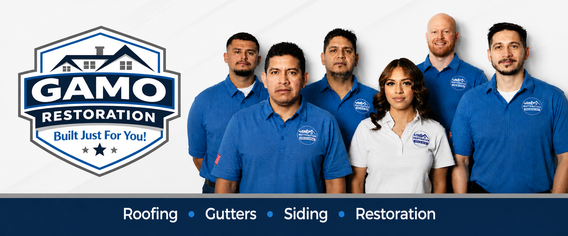 The GAMO Restoration team in branded blue polos